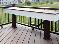 <b>3 Another great deck accessory is a cocktail table, for food and beverages while you enjoy your new outdoor space. </b>